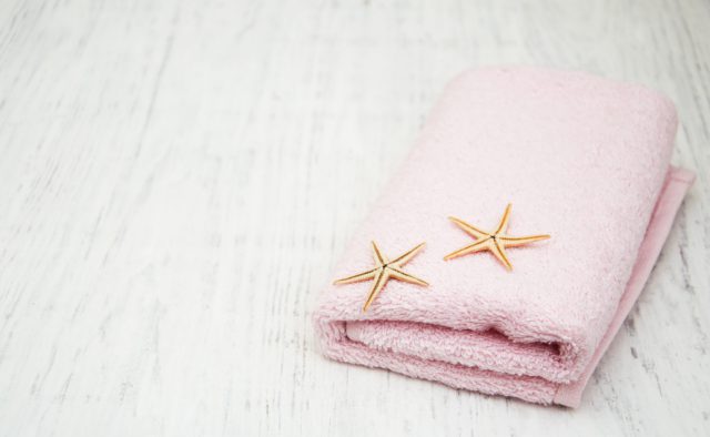 Blush towels will complement a neutral bathroom